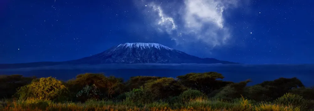 Starry night sky over Mount Kilimanjaro